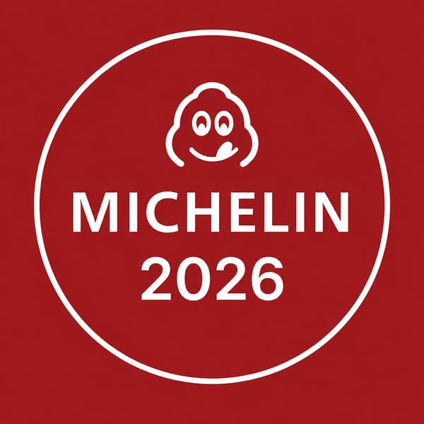 White Michelin Guide logo with a smiling face and "MICHELIN 2026" text on a red background.