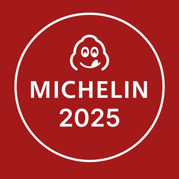 Michelin Guide 2025 award logo, a white circle with a smiling chef icon on a red background.